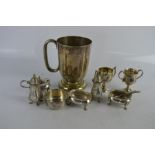 Two silver trophy's, a silver dish, toegher with two plated salts, tankard and other items. 2.