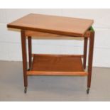 A mid century card table / trolley.