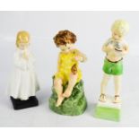 Three Royal Worcester figurines, including Friday's Child.