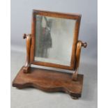 A small Victorian mahogany toilet mirror.