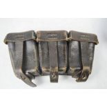 A WWII Stecher-Frieberg 1942 German K98 ammo pouch.