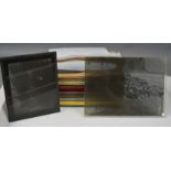 A group of glass negatives, late 19th/early 20th century depicting people, buildings etc.