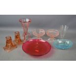A retro glass vase, candlesticks, dish and ice cream dishes.