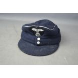 A German 1942 Luftwaffe cap, with makers mark.