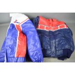 Two new Yamaha jackets, red white and blue, both size S.