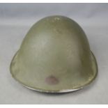 A 1972 CWL military helmet.