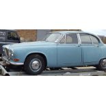 A vintage Daimler Sovereign saloon. 4235cc, petrol, blue, reg no UPM 890H