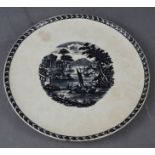 A Wedgwood black and white charger, 32cm diameter.