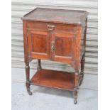 An Edwardian mahogany wash stand.