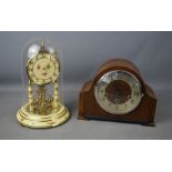 A 1950s mantle clock, and a Heininger & Obergfell clock.