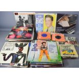 A group of 7" singles & LPs records, including Classical & Jazz and Elvis Presley GI Blues record.