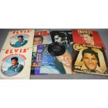 A group of Elvis records.