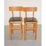 Two mid-century small chairs.