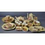 An Aynsley orchard gold tea set, coffee set, and other items in the same pattern, by D. Jones.