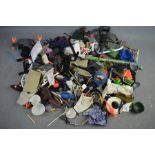 A group of Action Men, accessories to include bazooker, guns, helmets, parachutes and others.