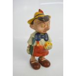 An early 20th century continental painted Pinocchio.