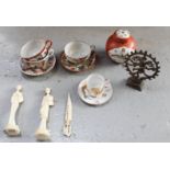A group of Chinese cups and saucers, ginger jar, resin figures, an Indonesian bodhisatta and