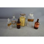 A group of Vintage chemists bottles, each bearing labels: Cret Preaec, Capici, Chloroform, SPT