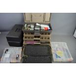 A quantity of tackle boxes, to include accessories; floats, hooks, line, punches and other items.