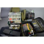 A group of fishing tackle boxes and bags by Grays and Middy to include a large amount of tackle