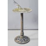 A garden cast metal sundial, 80cm high.