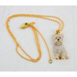 A gilt metal, enamel and diamante Scottie dog pendant necklace.
