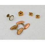 Three 9ct gold collar studs, 2.1g, and a pair of gold plated cufflinks.