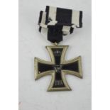 A WWI German Iron Cross, late war issue.