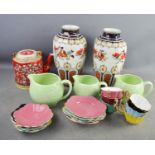 A Chinese tea pot, a pair of Clifford vases, a trio of Falcon ware jugs, and a set of six Royal