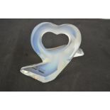 A Lalique Ribbon Heart ornament, 2006, with original box and certificate, 6cm high.