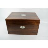 A 19th century rosewood vanity case, fitted interior, oval pearl inlaid top and escutcheon.