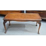 An oak glass top coffee table with carved cabriole legs, 42 by 37 by 51cm.