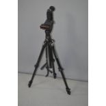 A Manfrotto tripod 055MF4 with a Wimberley tripod head.