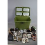 A quantity of fly fishing equipment to include wet and dry flys, five fly fishing reels to include