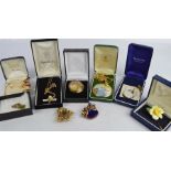 A quantity of brooches, including Wedgwood, silver and pearl, hat pins, and other items.