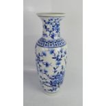 An Early 20th century Chinese hand painted blue and white vase, 46cm high.