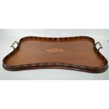 A 19th century mahogany tea tray, inlaid with shell motif, 56 by 36cm.