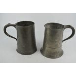 Two 19th century pewter quart tankards.