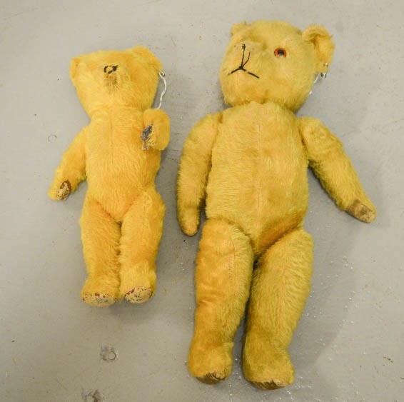 Two vintage teddy bears, one musical example.
