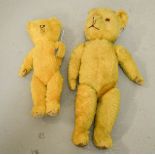 Two vintage teddy bears, one musical example.