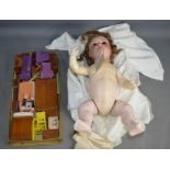 A German 1930s doll named by Heuback Koppelsdorf no.320.0, together with a group of vintage dolls