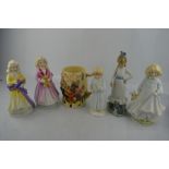 A group of porcelain figures, including Royal Doulton Hope, Charity, Faith, Coalport example and Nao