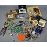 A quantity of costume jewellery including hair slide, necklaces, beaded necklaces, brooches,