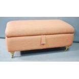 A modern upholstered ottoman.