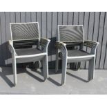 A set of modern garden chairs.