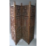 An Indian carved four fold screen.