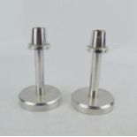 A pair of steel Mid-Century candlesticks, 11cm high.