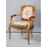 A French style needlework tapestry upholstered armchair.