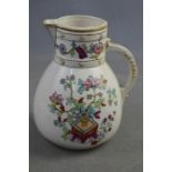 An early Worcester hand painted milk jug, 17cm high.