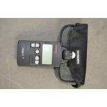 A Gossen Digipro F light meter with case.